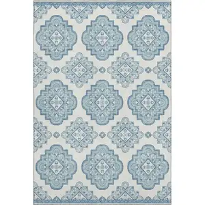 Photo of Teal And Ivory Medallion Washable Area Rug With UV Protection