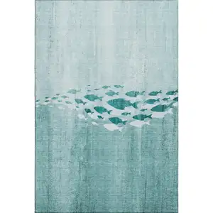 Photo of Teal And Ivory Nautical Washable Area Rug With UV Protection