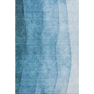 Photo of Teal And Ivory Ombre Washable Area Rug With UV Protection