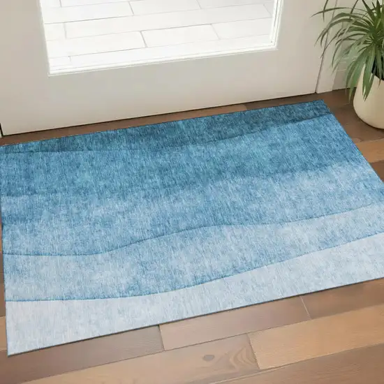 Teal And Ivory Ombre Washable Area Rug With UV Protection Photo 1