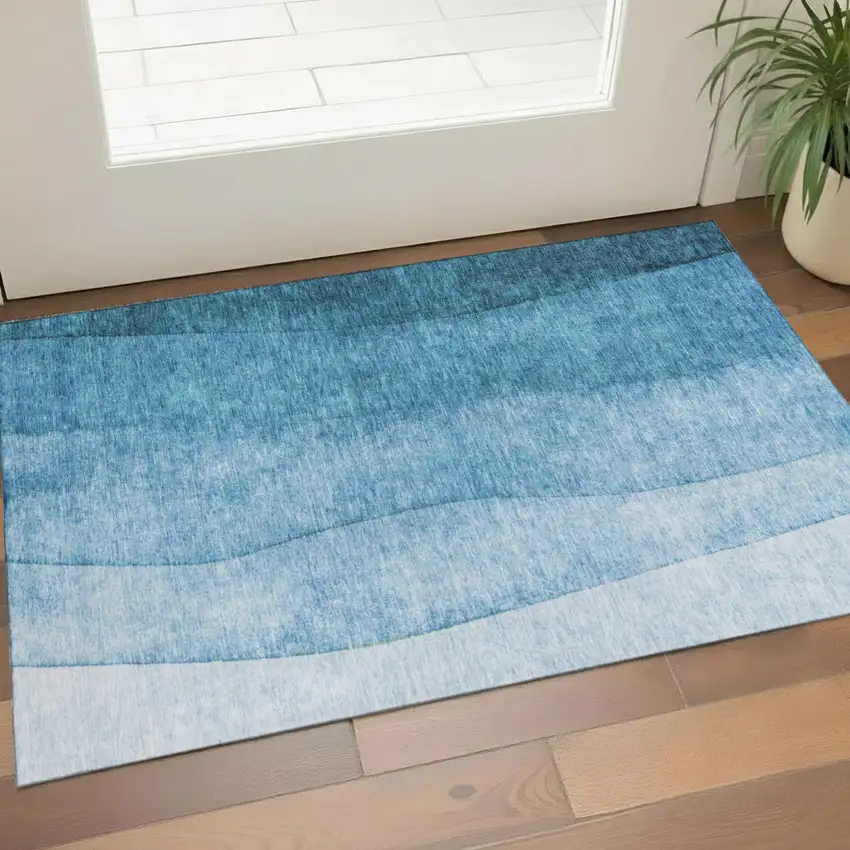 Teal And Ivory Ombre Washable Area Rug With UV Protection Photo 1