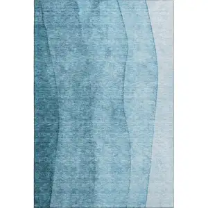 Photo of Teal And Ivory Ombre Washable Area Rug With UV Protection