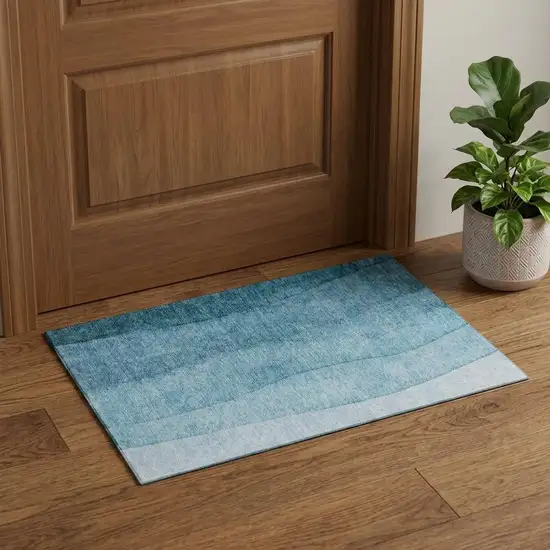 Teal And Ivory Ombre Washable Area Rug With UV Protection Photo 1