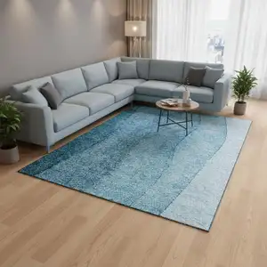 Photo of Teal And Ivory Ombre Washable Area Rug With UV Protection