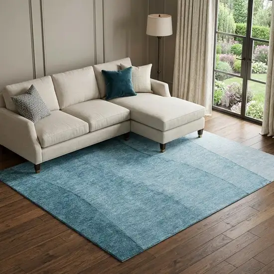 Teal And Ivory Ombre Washable Area Rug With UV Protection Photo 1
