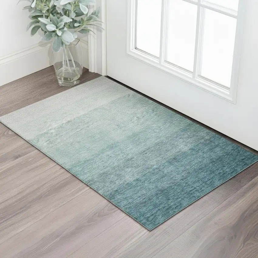 Teal And Ivory Ombre Washable Area Rug With UV Protection Photo 1