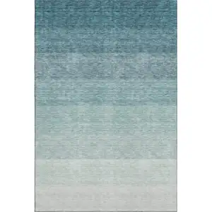 Photo of Teal And Ivory Ombre Washable Area Rug With UV Protection