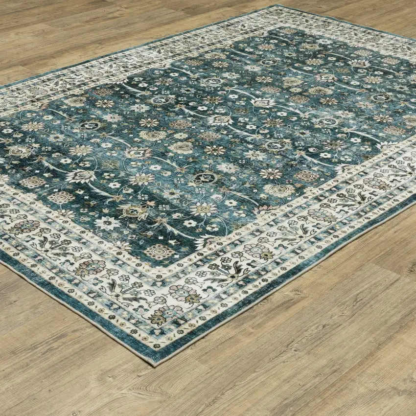 Teal And Ivory Oriental Distressed Area Rug Photo 9