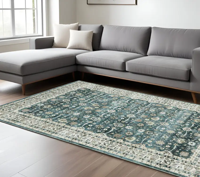 Teal And Ivory Oriental Distressed Area Rug Photo 1