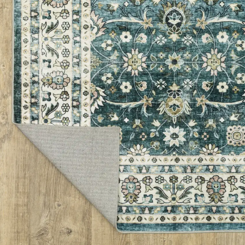 Teal And Ivory Oriental Distressed Area Rug Photo 6