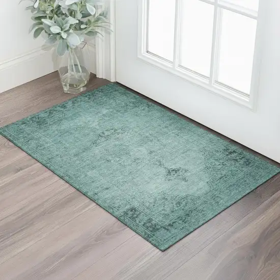 Teal And Ivory Oriental Washable Area Rug With UV Protection Photo 1