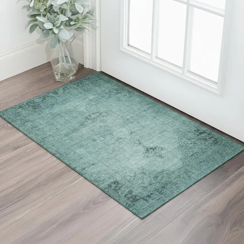 Teal And Ivory Oriental Washable Area Rug With UV Protection Photo 1