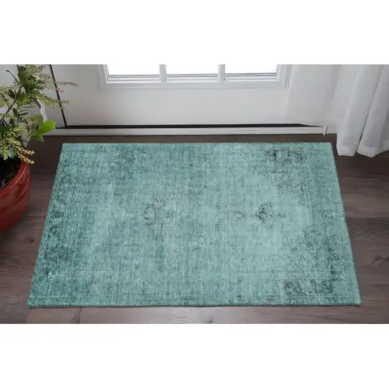 Teal And Ivory Oriental Washable Area Rug With UV Protection Photo 2