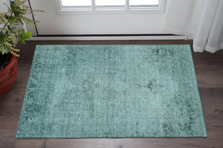 Teal And Ivory Oriental Washable Area Rug With UV Protection Photo 2