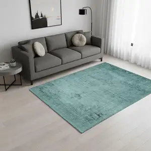 Photo of Teal And Ivory Oriental Washable Area Rug With UV Protection