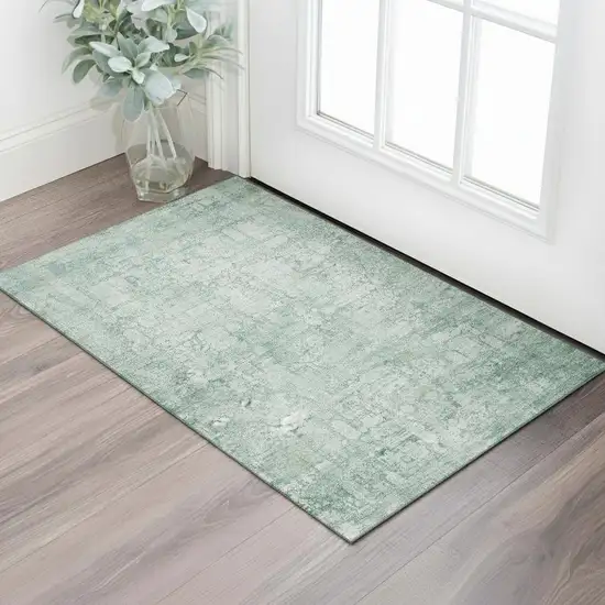 Teal And Ivory Oriental Washable Area Rug With UV Protection Photo 2