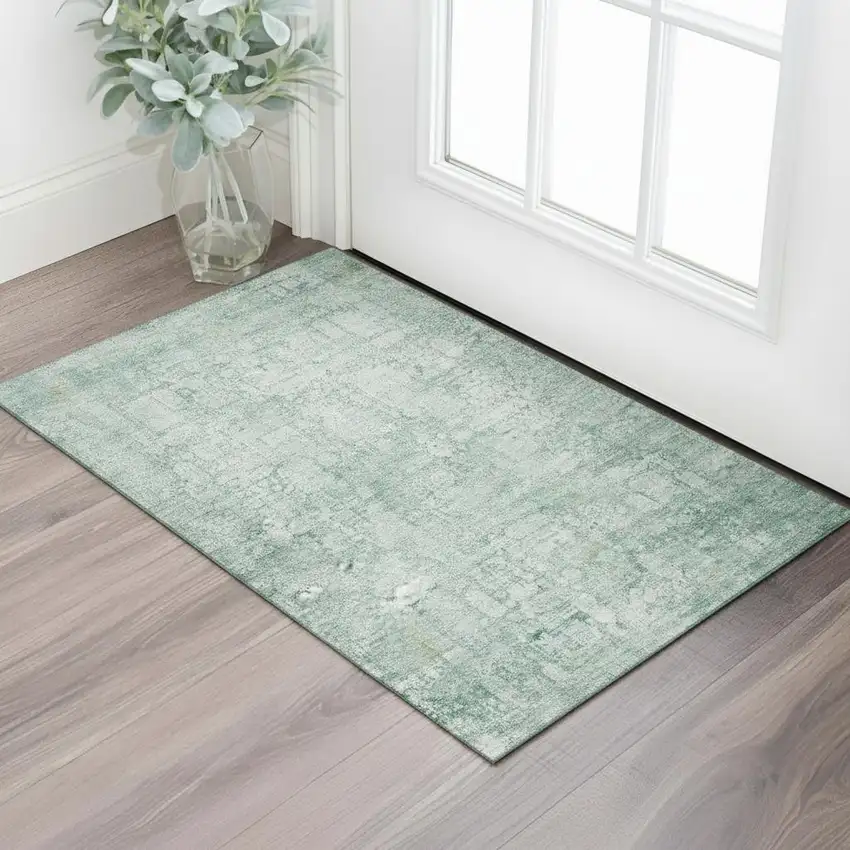 Teal And Ivory Oriental Washable Area Rug With UV Protection Photo 2