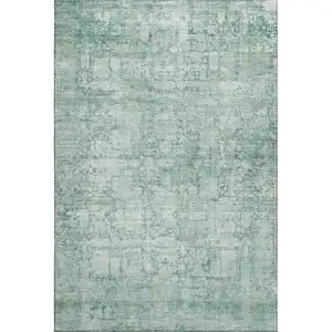 Photo of Teal And Ivory Oriental Washable Area Rug With UV Protection