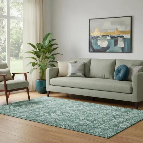 Teal And Ivory Oriental Washable Area Rug With UV Protection Photo 2
