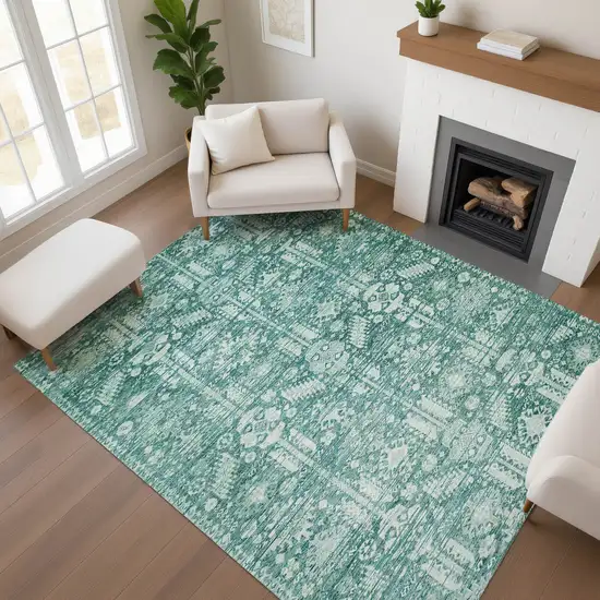 Teal And Ivory Oriental Washable Area Rug With UV Protection Photo 4