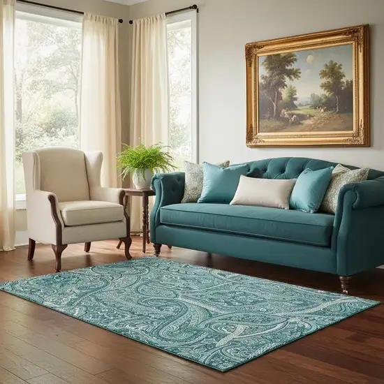 Teal And Ivory Paisley Washable Area Rug With UV Protection Photo 1