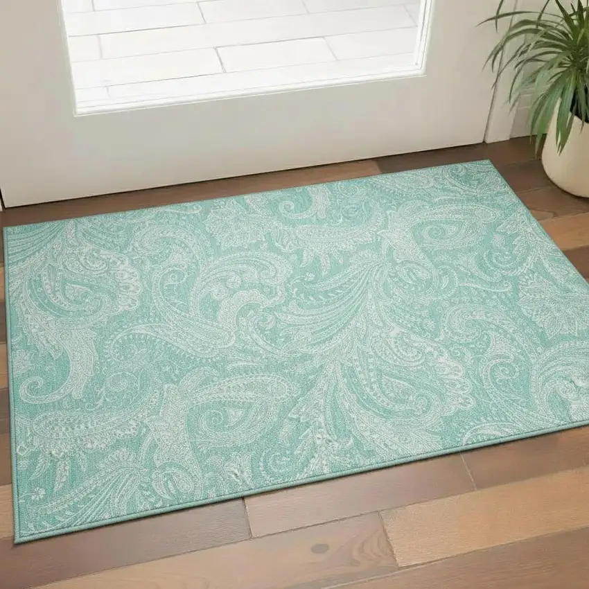 Teal And Ivory Paisley Washable Area Rug With UV Protection Photo 1