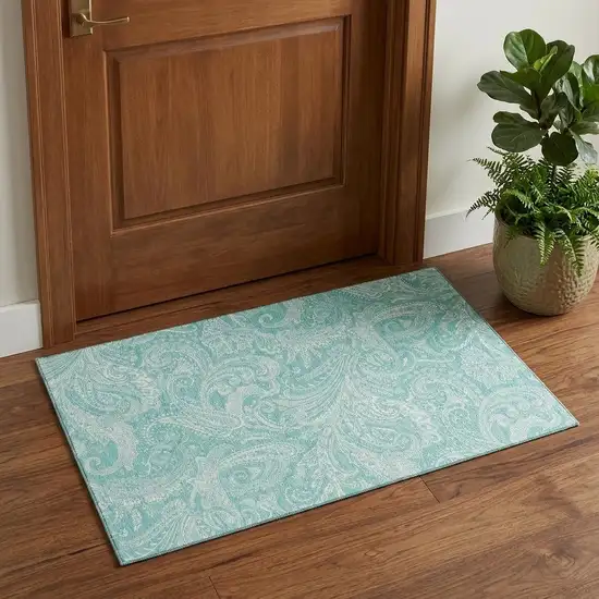 Teal And Ivory Paisley Washable Area Rug With UV Protection Photo 1