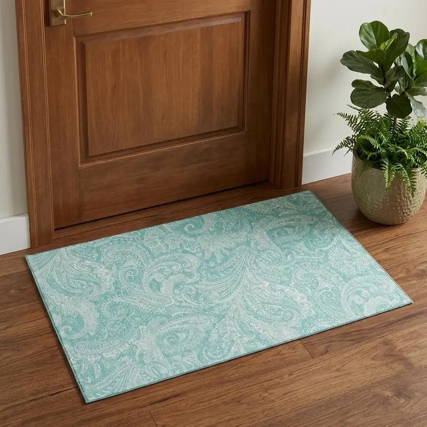 Teal And Ivory Paisley Washable Area Rug With UV Protection Photo 1
