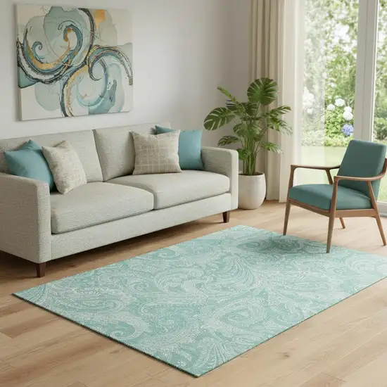Teal And Ivory Paisley Washable Area Rug With UV Protection Photo 1