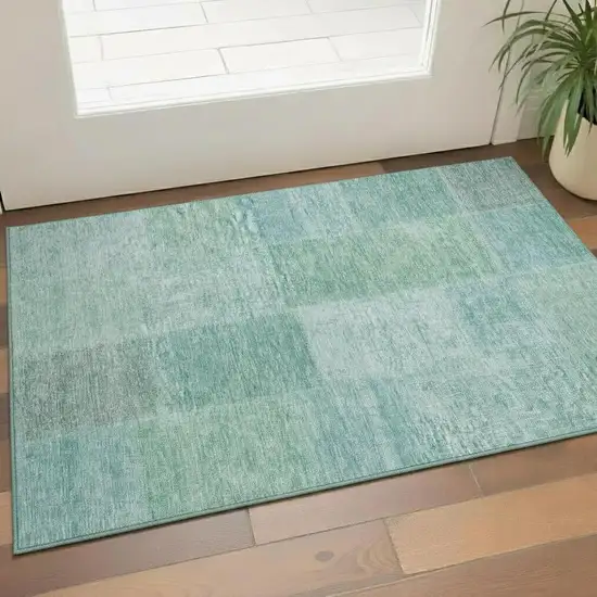 Teal And Ivory Patchwork Washable Area Rug With UV Protection Photo 1