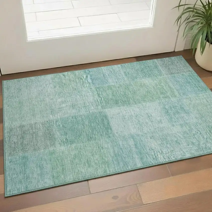 Teal And Ivory Patchwork Washable Area Rug With UV Protection Photo 1