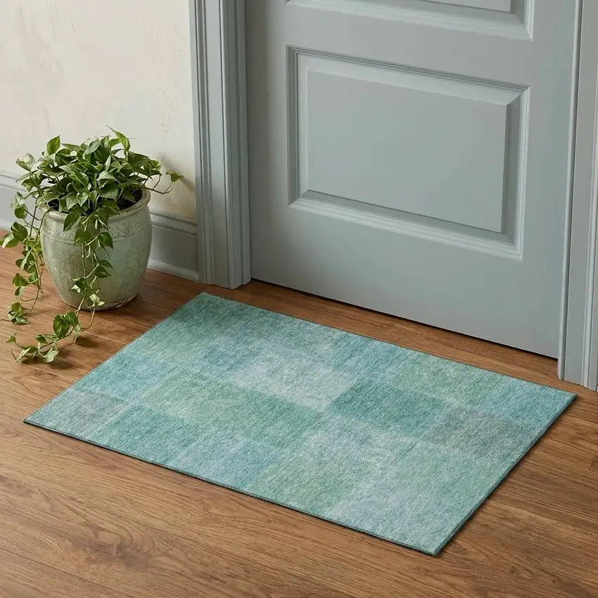 Teal And Ivory Patchwork Washable Area Rug With UV Protection Photo 1