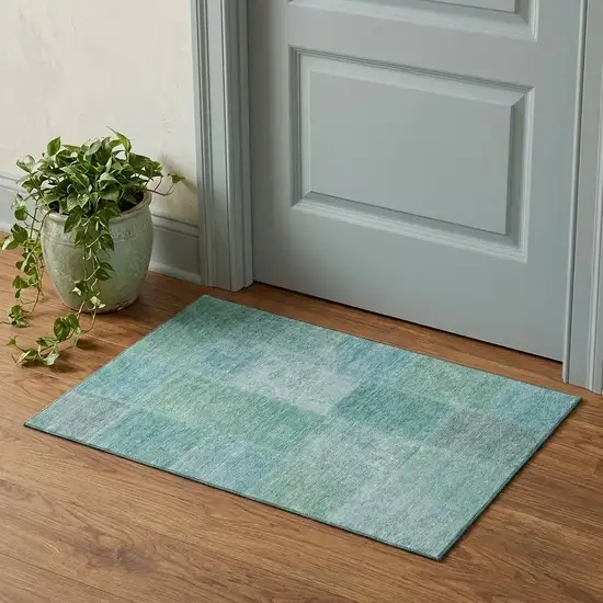Teal And Ivory Patchwork Washable Area Rug With UV Protection Photo 1