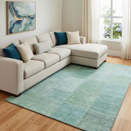 Teal And Ivory Patchwork Washable Area Rug With UV Protection Photo 1