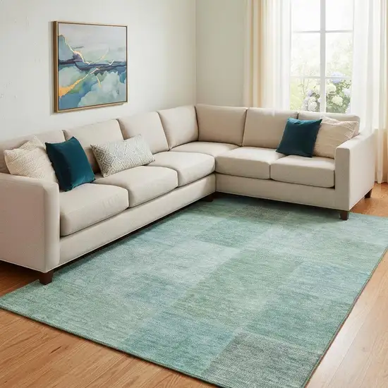 Teal And Ivory Patchwork Washable Area Rug With UV Protection Photo 1