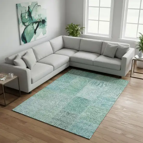 Teal And Ivory Patchwork Washable Area Rug With UV Protection Photo 1
