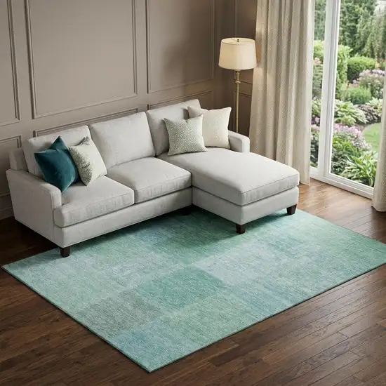 Teal And Ivory Patchwork Washable Area Rug With UV Protection Photo 1