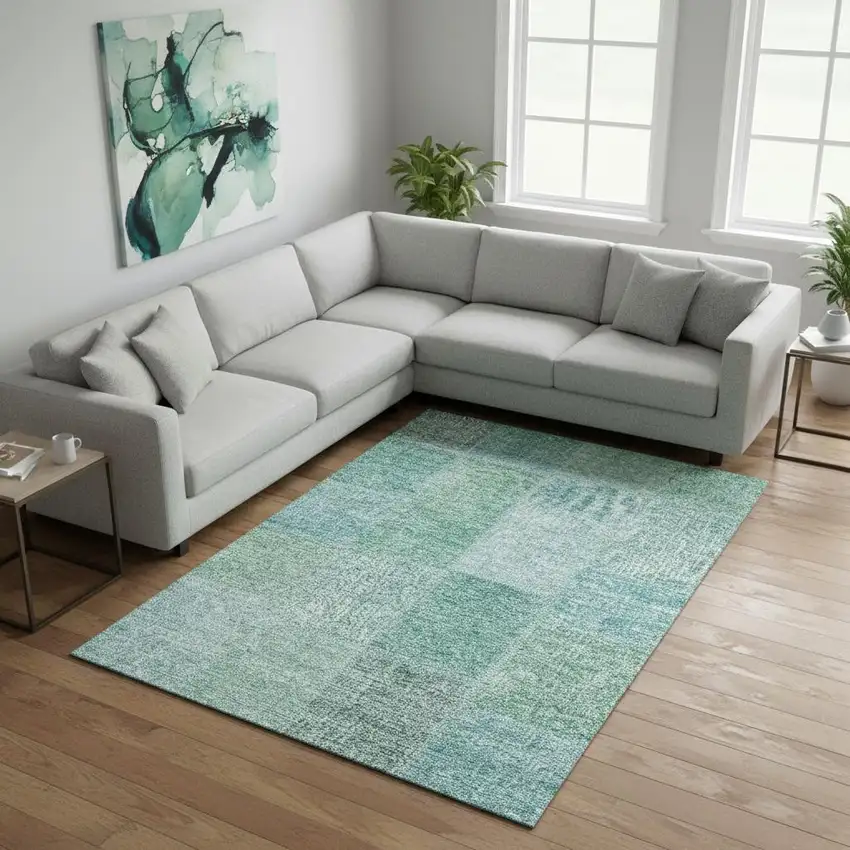 Teal And Ivory Patchwork Washable Area Rug With UV Protection Photo 1