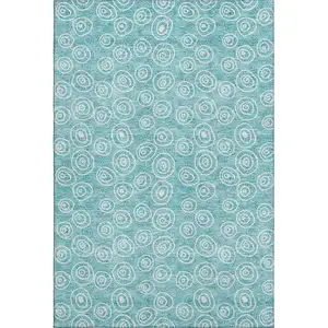 Photo of Teal And Ivory Polka Dot Washable Area Rug With UV Protection