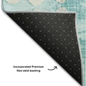 Photo of Teal And Ivory Polka Dot Washable Area Rug With UV Protection