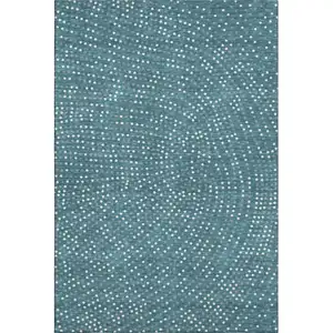 Photo of Teal And Ivory Polka Dot Washable Area Rug With UV Protection