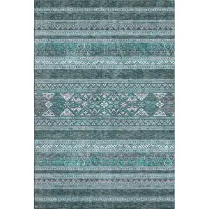 Photo of Teal And Ivory Southwestern Washable Area Rug With UV Protection