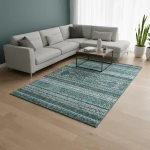 Photo of Teal And Ivory Southwestern Washable Area Rug With UV Protection
