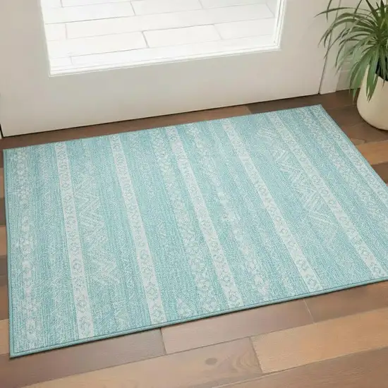 Teal And Ivory Southwestern Washable Area Rug With UV Protection Photo 1