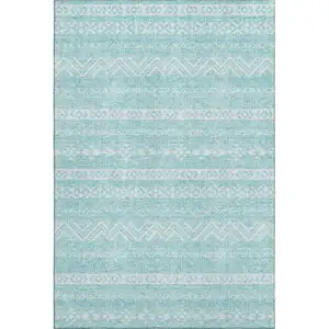 Photo of Teal And Ivory Southwestern Washable Area Rug With UV Protection