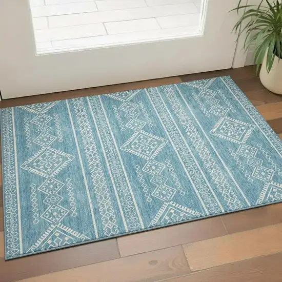 Teal And Ivory Southwestern Washable Area Rug With UV Protection Photo 1