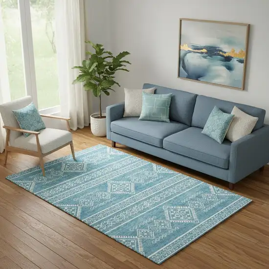 Teal And Ivory Southwestern Washable Area Rug With UV Protection Photo 1