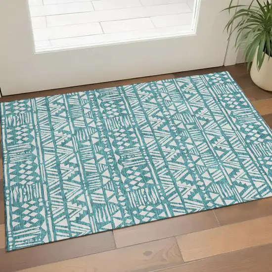 Teal And Ivory Southwestern Washable Area Rug With UV Protection Photo 1