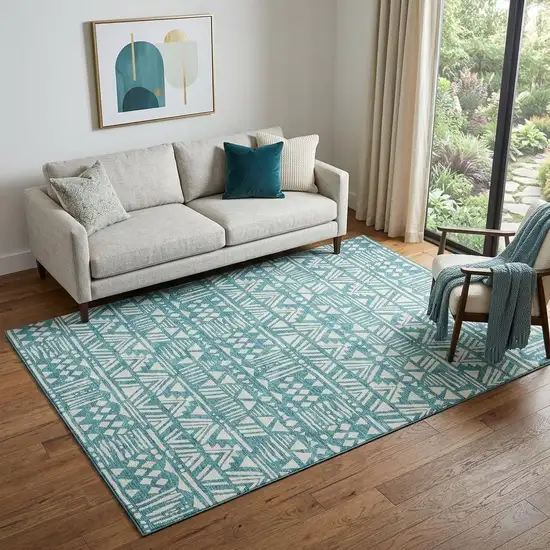 Teal And Ivory Southwestern Washable Area Rug With UV Protection Photo 1