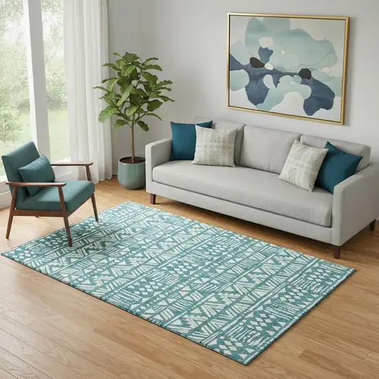 Teal And Ivory Southwestern Washable Area Rug With UV Protection Photo 1